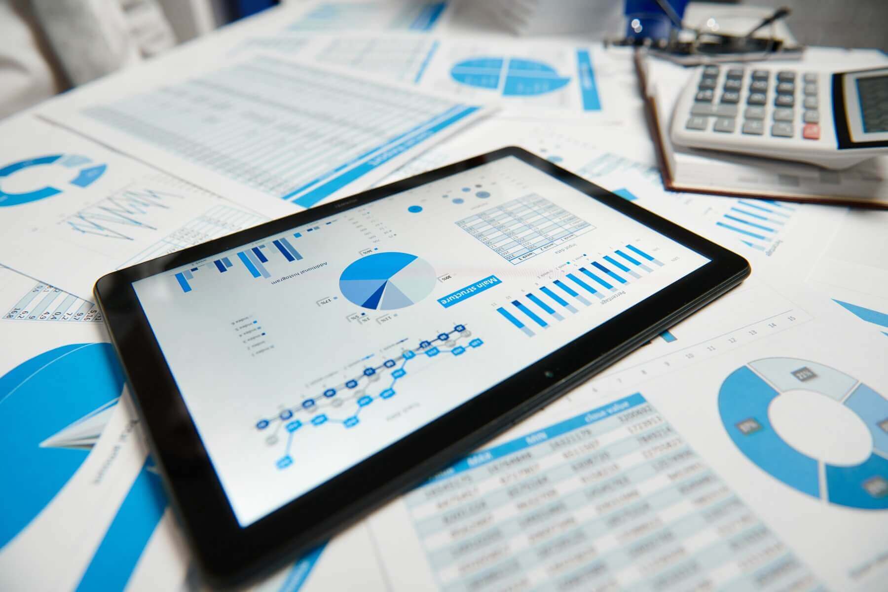 Cloud accounting dashboard on tablet showing financial reports and Xero software integration