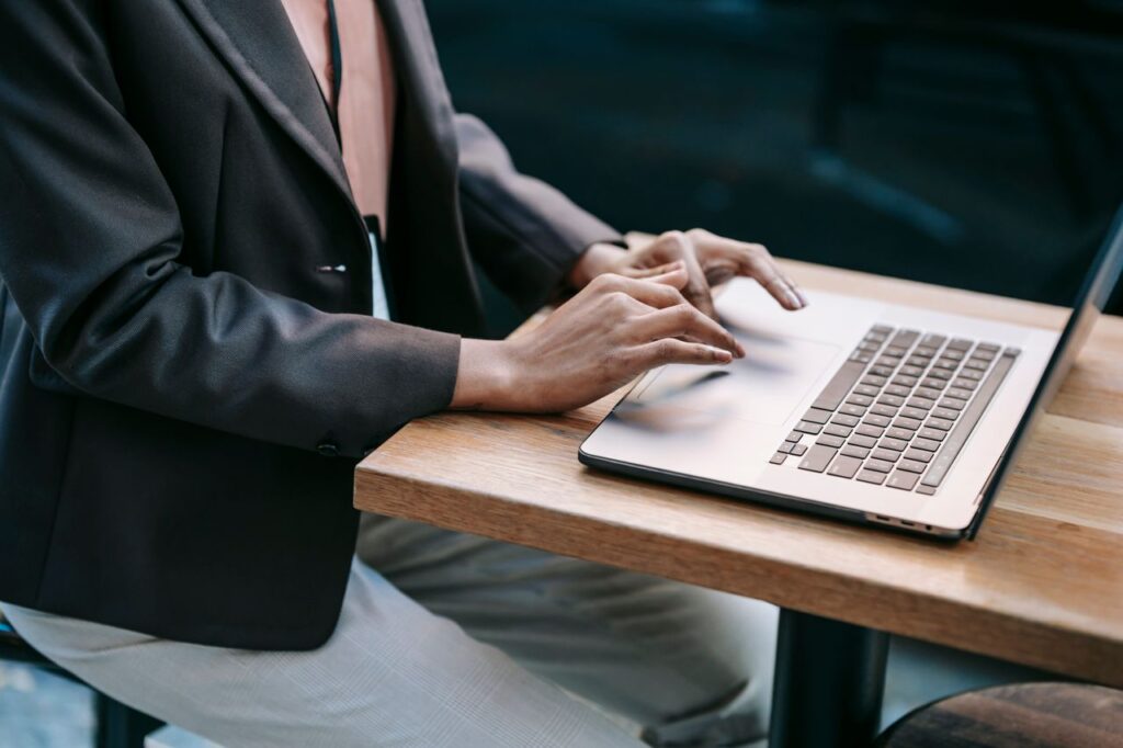 female remote worker using laptop at work